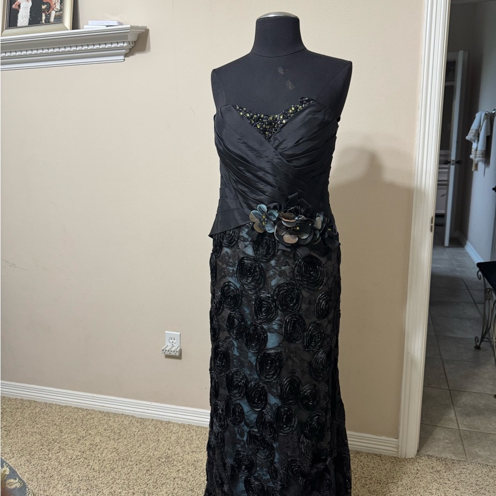 Montage by Mon Cheri Strapless Black Evening Gown with Floral Rosette Skirt
